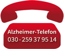 Rotes Telefon mit aufgedruckter Rufnummer